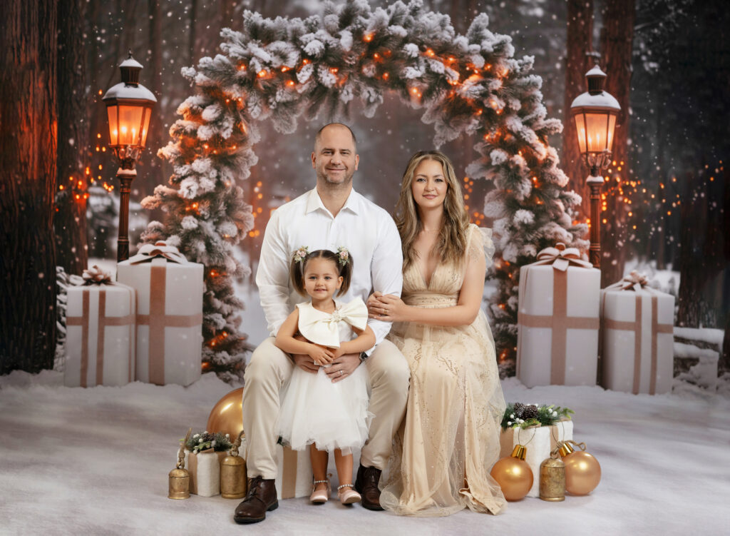 Family taking winter wonderland photos in atlanta studio.