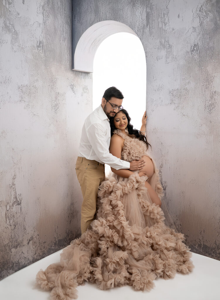 Mom and Dad holding baby bump. Photo by Jenni Nikki- Atlanta Maternity Photographer.