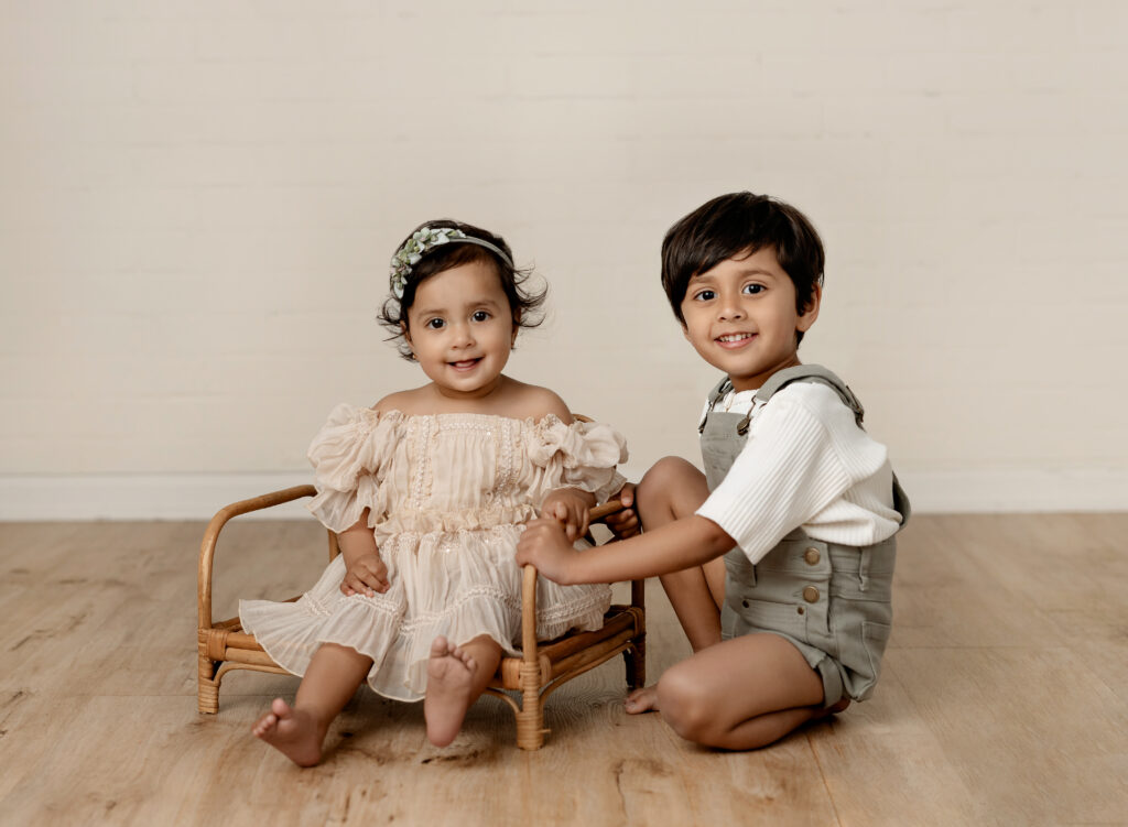Brother and sister posing for sibling photo. Atlanta Children's Photographer